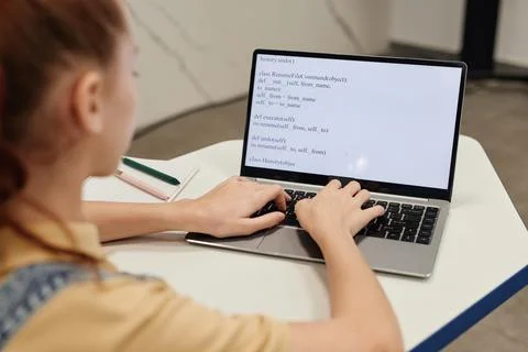 Girl Coding in Class Stock Photos