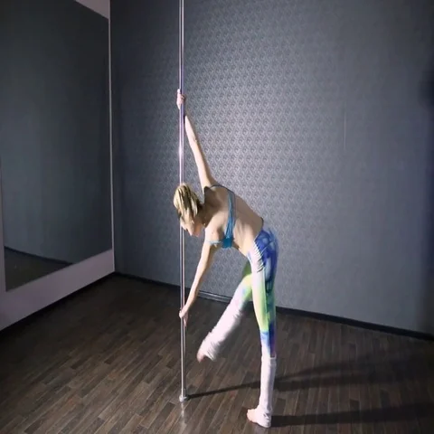 Girl in color dancing pole dance Stock Footage 69500873