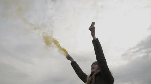Girl with colored smoke Stock Footage 62023398