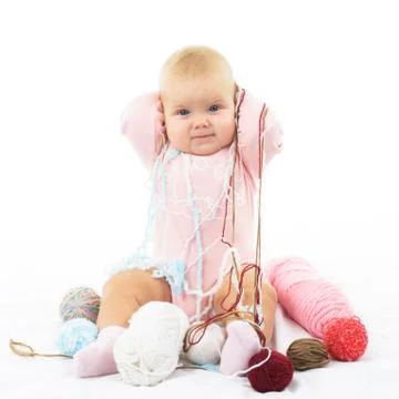 Girl with colored thread Stock Photos
