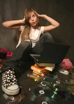 Girl with a computer Stock Photos