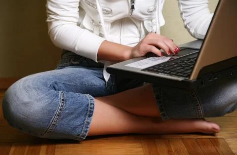 Girl with a computer Stock Photos