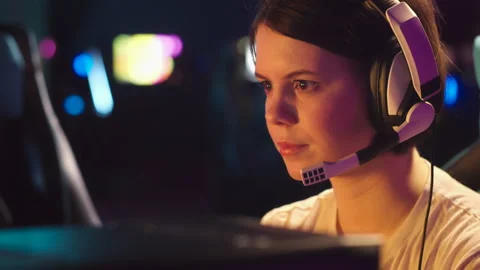 Girl computer player plays on the computer Video stock 149389095