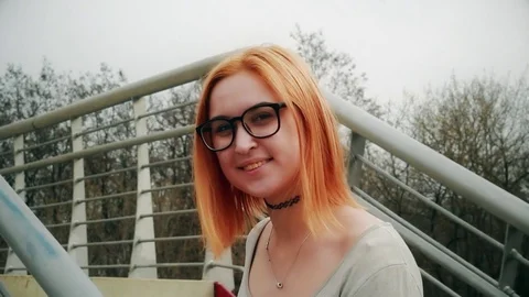 Girl on an concrete bridge Stock Footage