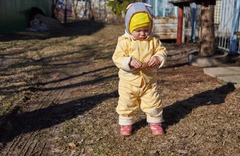 The girl with the cone on walk Stock Photos