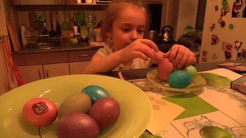 Girl cook Happy Easter egg at the kitchen Stock Footage 88241237