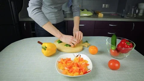 Girl cook prepares in the kitchen Stock-Footage 70548828