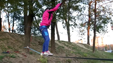 Girl crossing the rope fall return Stock-Footage 42635818