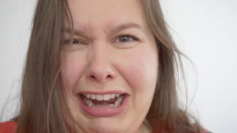 Girl is crying into the camera and looking at his folds of fat on the stomach Stock Footage 121633956