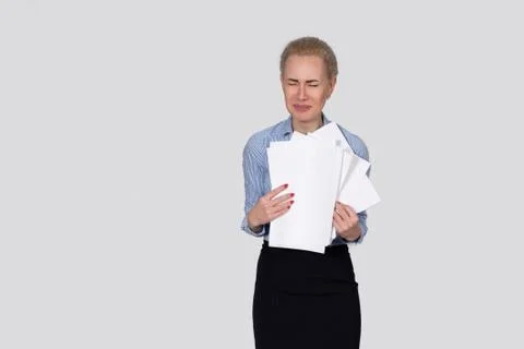 A Girl is Crying with Documents. Copy Space Stock Photos