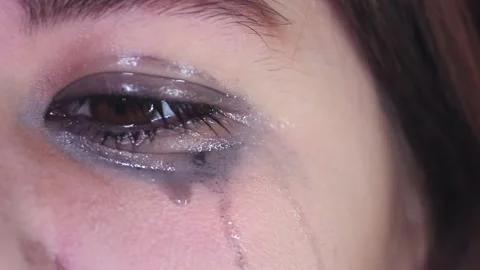 Girl crying, eye close-up. Copy space Stock Footage 137463448