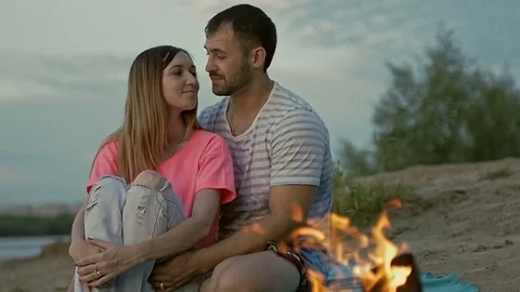 Girl cuddles up to the guy Video stock 79604436