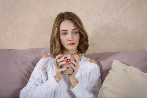Girl with a cup of coffee Stock Photos