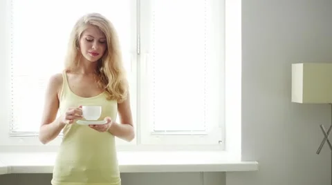Girl with a cup of tea Stock Footage 68048957