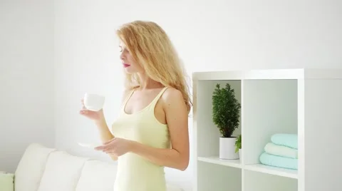 Girl with a cup of tea Stock Footage 68048964