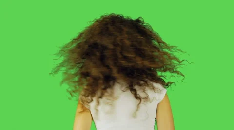 Girl with curls dancing in the back with the wind Stock Footage 66507110
