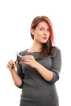 Girl cutting a cigarette with scissors Stock Photos