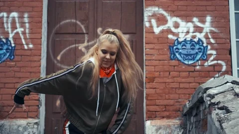 A girl dancer comes down the steps. Stock Footage 141002962