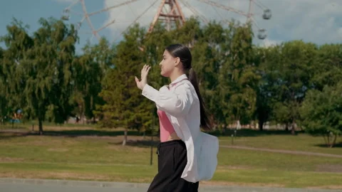 Girl dancer dancing energetic dance on the street in urban atmosphere Video stock 244396150