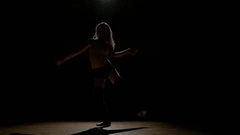 Girl dancer doing work out elements of contemporary dance in studio Stock Footage 74718334