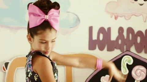 The girl dances with candy Video stock 55654638