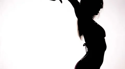 Girl dances in Silhouette in Warehouse Stock Footage 42560153