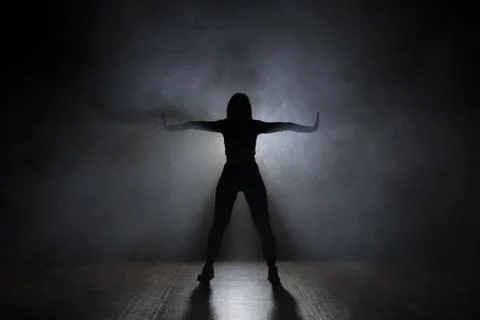 Girl dancing. backlight Stock Photos