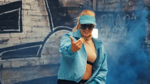 Girl dancing in a blue jacket Stock Footage 138759041