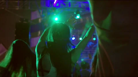Girl dancing at concert Stock Footage 63083363