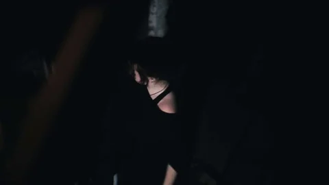 Girl dancing in the dark Stock Footage 76508407