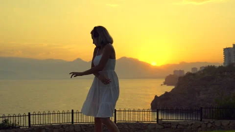 The girl is dancing during sunset Stock Footage 279142181