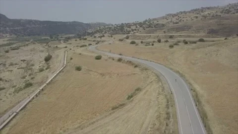 The girl is dancing on an empty road. Stock Footage 149109262