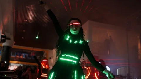 Girl dancing with laser pointers Stock Footage 105295903