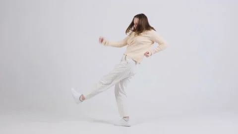 Girl dancing over white background, copy space Stock Footage 166096182