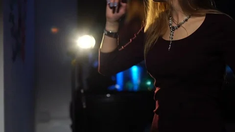 The girl is dancing at a party Видео 83011276