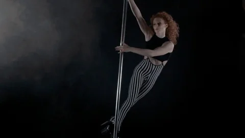 The girl is dancing Pole Dance Stock Footage 76502069