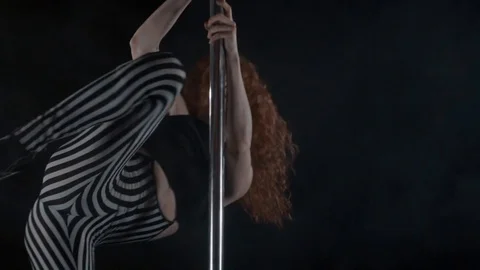 The girl is dancing Pole Dance Stock Footage 76502144