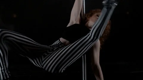 The girl is dancing Pole Dance Stock Footage 76502208