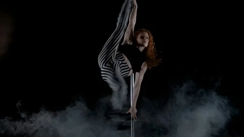 The girl is dancing Pole Dance Stock Footage 76502355