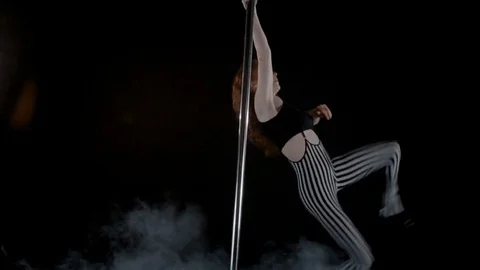 The girl is dancing Pole Dance Stock Footage 76502365