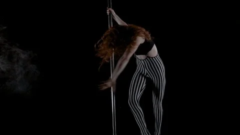 The girl is dancing Pole Dance Stock Footage 76502545