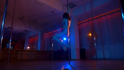 Girl dancing on a pylon. Striptease danc... Stock Video Pond5