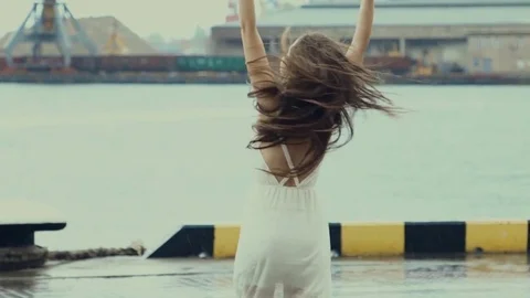 Girl dancing in the rain 3 Stock Footage 79265132