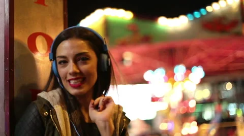 Girl dancing to the rhythm of music with headphones Stock Footage 59556161