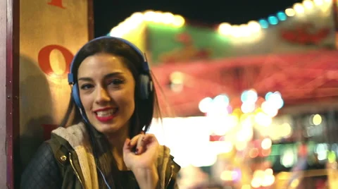 Girl dancing to the rhythm of music with headphones Stock Footage 59556165