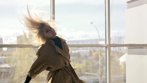 Girl dancing by the window Video stock 140922412