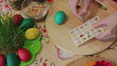 Girl decorates Easter eggs Stock Footage 76649181