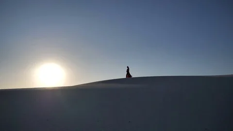 Girl in the desert at sunset Stock Footage 80652837