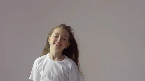 The girl with the developing hair in studio Stock Footage 87389711