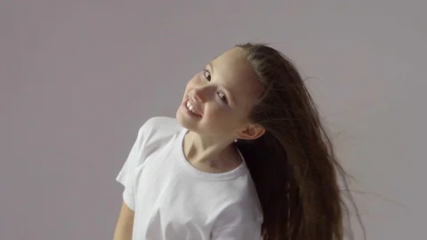 The girl with the developing hair in studio Stock Footage 87389761